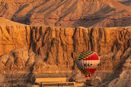 Temple of Hatshepsut and hot air balloon on Luxor West Bank Egypt